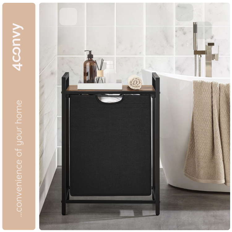 Szafka 4convy z pojemnikiem na pranie, idealna do łazienki lub pralni. Z drewnianym blatem na akcesoria, jak kosmetyki i ręczniki, zapewnia porządek i styl w każdej przestrzeni.